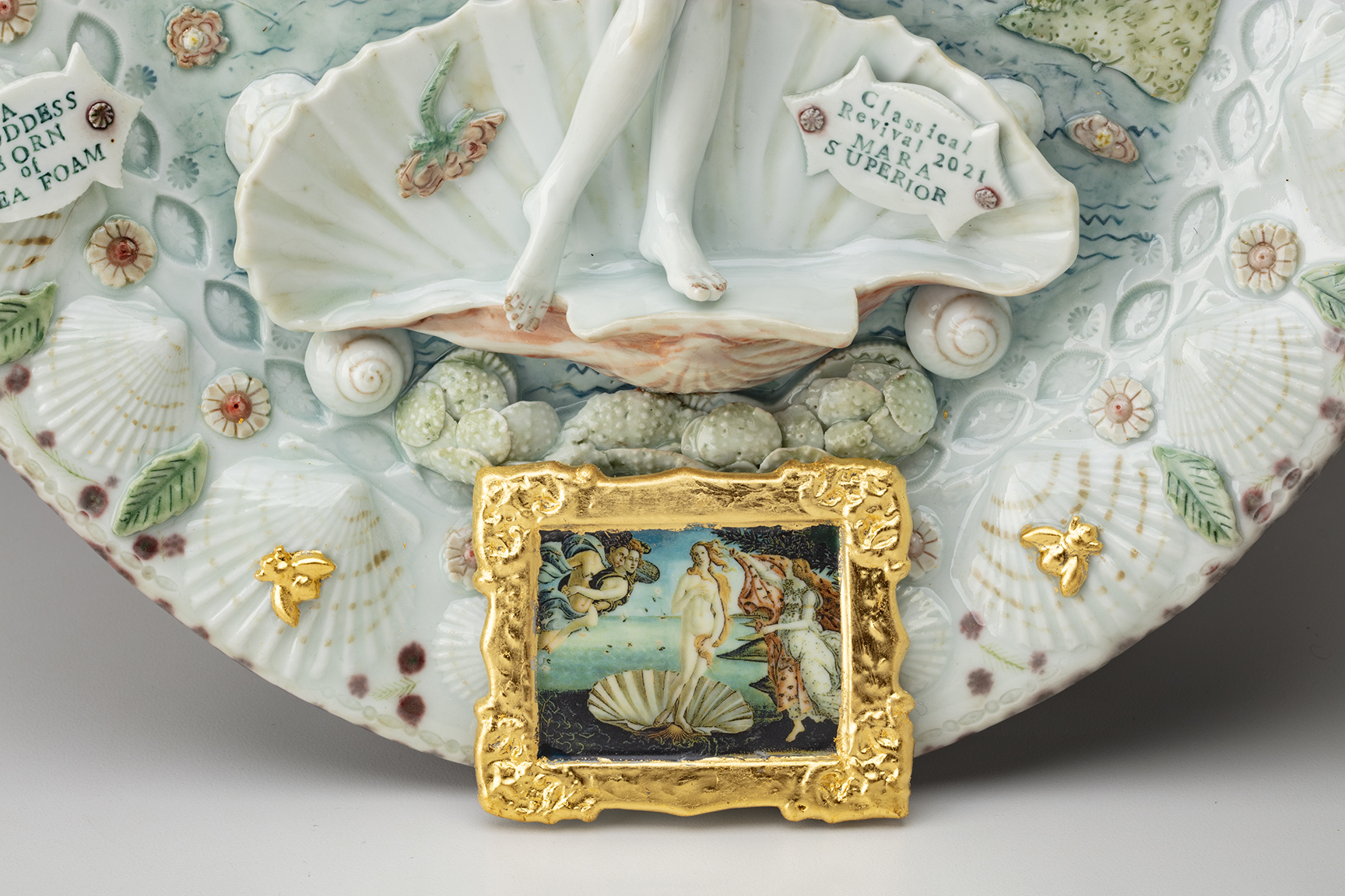 Mara Superior, "Birth of Venus (After Sandro Botticelli)", 2021, high-fired porcelain, ceramic oxides and underglazes, gold leaf, epoxy, digital print, 17.5 x 14 x 2".