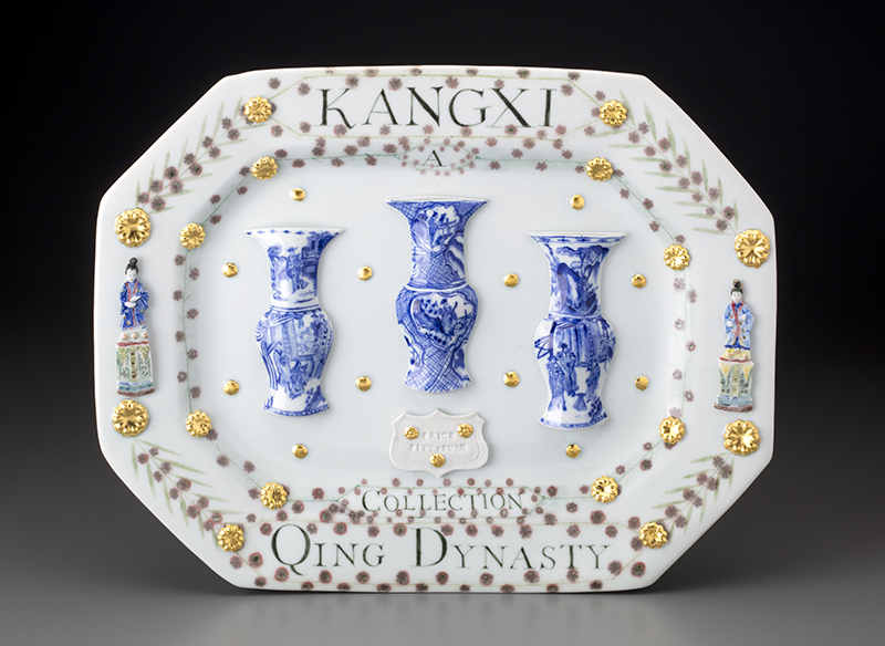 Mara Superior, “Kangxi Period, Qing Dynasty/ A Collection” 2018, porcelain, underglazes, oxides, glaze, gold leaf, 12.5 x 16 x 2.5″.